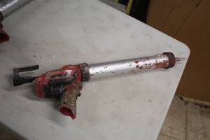 lot 385 image: Milwaukee 12V Caulk and Adhesive Gun 2441-20