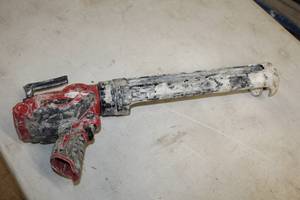 lot 387 image: Milwaukee 12V Caulk and Adhesive Gun 2441-20