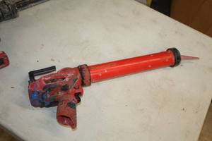 lot 388 image: Milwaukee 12V Caulk and Adhesive Gun 2441-20