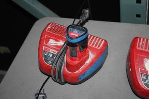 lot 393 image: Milwaukee M12 Battery Charger with Battery
