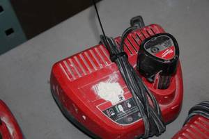 lot 396 image: Milwaukee M12 Battery Charger with Battery