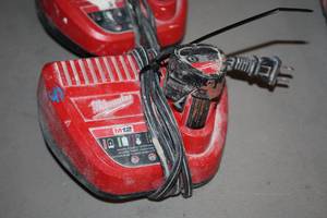 lot 397 image: Milwaukee M12 Battery Charger with Battery