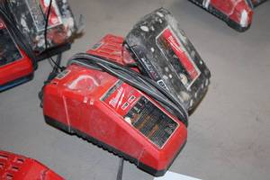 lot 400 image: Milwaukee M12M18 Battery Charger with M18 Red Lithium Battery