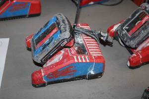 lot 402 image: Milwaukee M12M18 Battery Charger with M18 Red Lithium CP 1.5 Battery