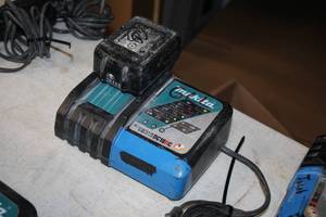 lot 535 image: Makita Li-ion 14.4-18V  Ni-MH 7.2-14.4V Battery Charger DC18RC with 18V 5Ah Lithium-Ion Battery