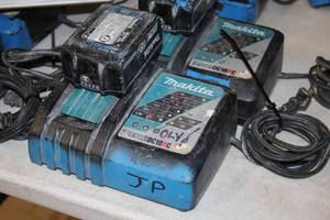 lot 540 image: Makita Li-ion 14.4-18V  Ni-MH 7.2-14.4V Battery Charger DC18RC with 18V 5Ah Lithium-Ion Battery
