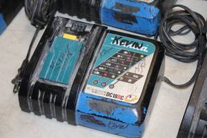 lot 552 image: Makita Li-ion 14.4-18V  Ni-MH 7.2-14.4V Battery Charger DC18RC