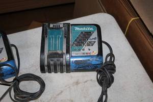 lot 553 image: Makita Li-ion 14.4-18V  Ni-MH 7.2-14.4V Battery Charger DC18RC