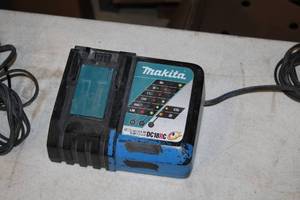 lot 555 image: Makita Li-ion 14.4-18V  Ni-MH 7.2-14.4V Battery Charger DC18RC