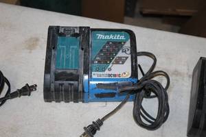 lot 556 image: Makita Li-ion 14.4-18V  Ni-MH 7.2-14.4V Battery Charger DC18RC