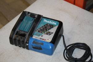 lot 557 image: Makita Li-ion 14.4-18V  Ni-MH 7.2-14.4V Battery Charger DC18RC