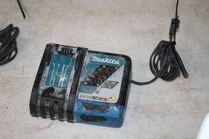 lot 560 image: Makita Li-ion 14.4-18V  Ni-MH 7.2-14.4V Battery Charger DC18RC