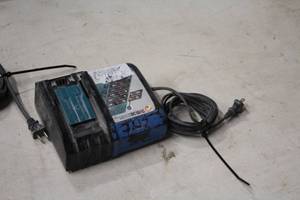 lot 573 image: Makita Li-ion 14.4-18V  Ni-MH 7.2-14.4V Battery Charger DC18RC