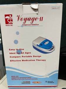 lot 40 image: Mada Inc. 277 Voyage-II Compact Portable Compressor Nebulizer and Welch Allyn Blood Pressure Aneroid Sphygmomanometer with Pouch Bag - Both Good Condition