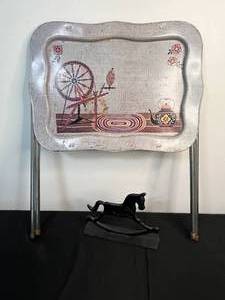 lot 36 image: Vintage Metal TV Tray with Stand and Cast Iron Rocking Horse Decor