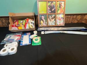 lot 79 image: Lot of Command Picture Hanging Strips, Photo Frame, and Curtain Rods