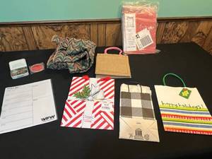 lot 87 image: Assorted Items Lot - Decorative Scarf Valance, Gift Bags, Planner, and More