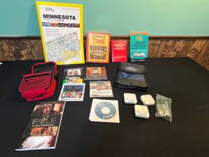 lot 88 image: Mixed Lot of Books, CDs, Earbuds, and Travel Bag