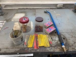 lot 20 image: Assorted Tools and Accessories Lot with Drill Bits, Matches, and More