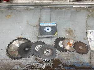 lot 110 image: Lot of Circular Saw Blades and 8-inch Wheel Brush