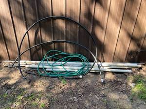 lot 188 image: Lot of Assorted PVC Pipes, Metal Pipes, and Hoses