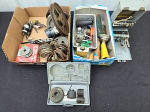 lot 123 image: Assorted Pulley Wheels, Drill Bits, and Hand Tools Lot