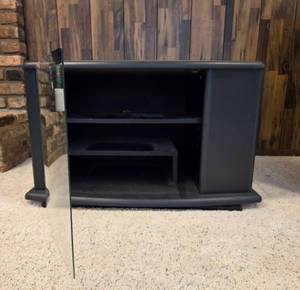 lot 196 image: Black TV Stand with Glass Door