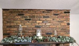 lot 209 image: Decorative Mantel Display with Frosted Garland and Oil Lamps