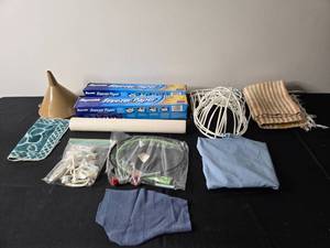 lot 228 image: Assorted Household Items Including Kitchen Towels, Freezer Paper, and Accessories