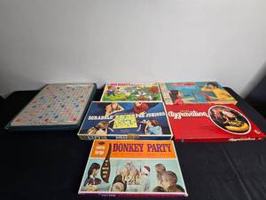 lot 246 image: Vintage Board Games Lot Scrabble, Battleship, Deluxe Aggravation, Bugs Bunnys Hideout, Scrabble for Juniors, Donkey Party
