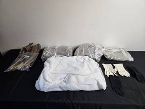 lot 249 image: Lot of Assorted Feathers and Rain Protective Clothing