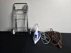 lot 255 image: Lot of Household Items Including Steam Iron, Extension Cords, and Folding Cart