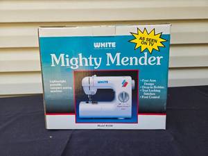 lot 338 image: WHITE Mighty Mender W100 Sewing Machine