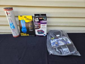 lot 339 image: Lava Lamp, Camelbak Cleaning Kit, Space Bag Set, and High Sierra Hydration Pack