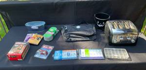 lot 289 image: Lot of Household Items Including Toaster, Fitness DVDs, Car Wash Sponge, and More