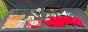lot 297 image: Mixed Household Items Including Apple Peeler, Napkins, and Wall Guards
