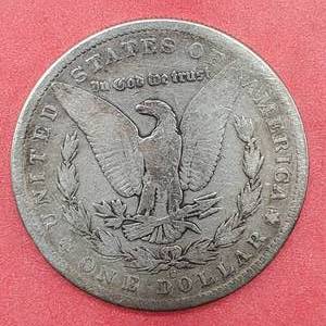 lot 9 image: 1884 Morgan Silver Dollar