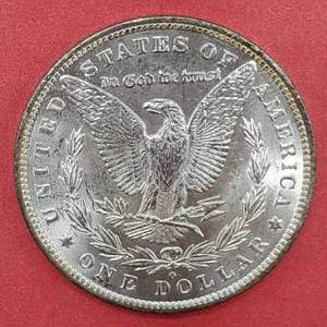 lot 10 image: 1884-O Morgan Silver Dollar, Higher Grade