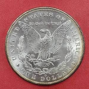 lot 12 image: 1885-O Morgan Silver Dollar, Higher Grade