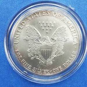 lot 49 image: 1997 American Silver Eagle in Airtite