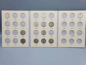 lot 151 image: 12 Walking Liberty Half Dollars in Album--12 different Dates