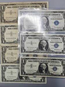 lot 283 image: 7 $1 Silver Certificates--3 in Plastic Sleeves