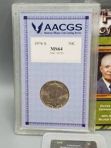 lot 288 image: 1 40% Silver Ike Dollar plus 18 more Ike Dollars, including 2 that are graded--Great Lot