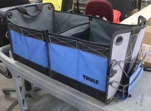 lot 49 image: Thule vehicle storage bag and 16x24 Square and large clipboard and small storage bags
