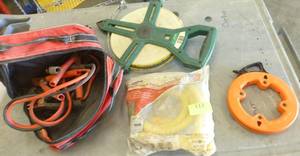 lot 113 image: 300 ft tape, fish tape, jumper cables, gas connection hose