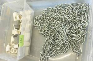 lot 133 image: PVC pipe connectors and a bunch of chain