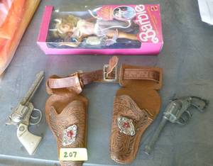 lot 207 image: Vintage Barbie and toy guns and holsters