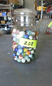 lot 208 image: Vintage marbles in a vintage Decker IA jar