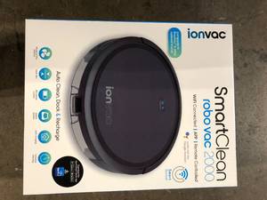 lot 15 image: Tzumi 14.4-Volt Ion Robotic Vacuum Cleaner Self-Charging Controlled Via Mobile App or Voice Activated Wi-Fi Connected  Customer Returns See Pictures