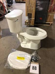 lot 50 image: Glacier Bay 12 inch Rough In Two-Piece 1.1 GPF1.6 GPF Dual Flush Elongated Toilet in White Seat Included  Customer Returns See Pictures
